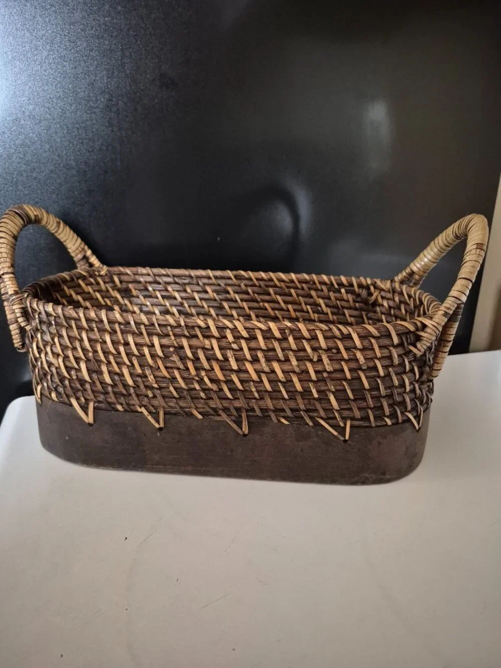 OVAL HAND-WOVEN WICKER STORAGE BASKET